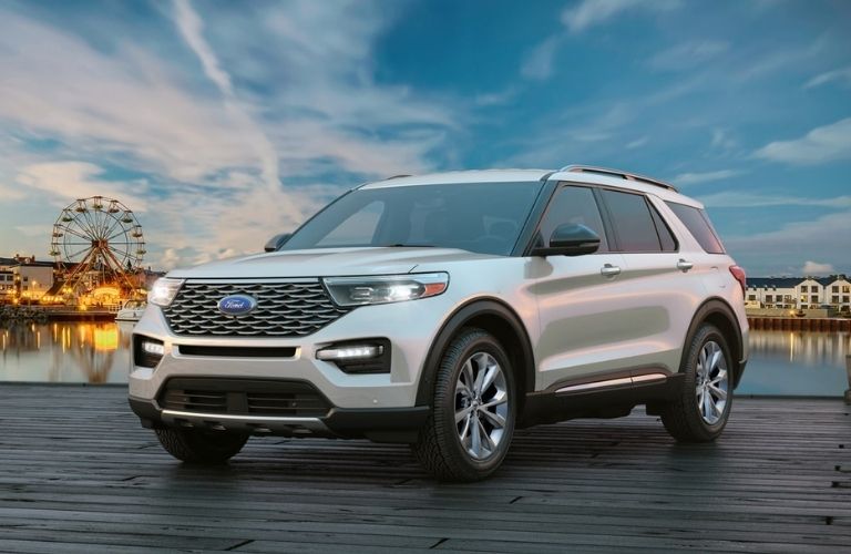 2021 Ford Explorer in front of a ferris wheel