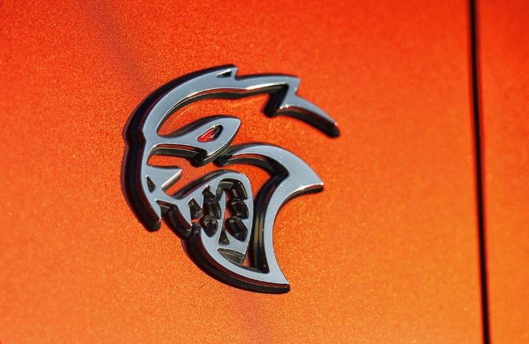 Close up of the logo of the 2022 Dodge charger is shown